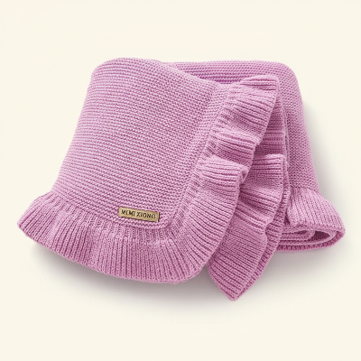 Couverture bebe tricot rose fond crème