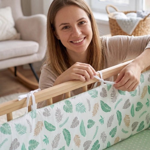 Tour de lit bébé feuilles maman l'installe dans lit bébé