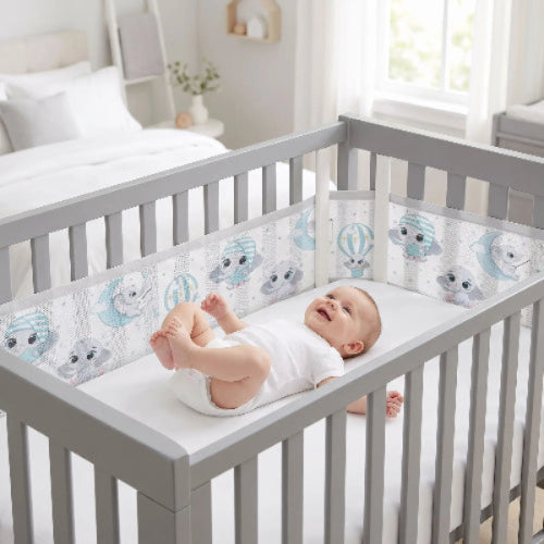 tour de lit respirant, motif éléphant bébé dans lit sourit